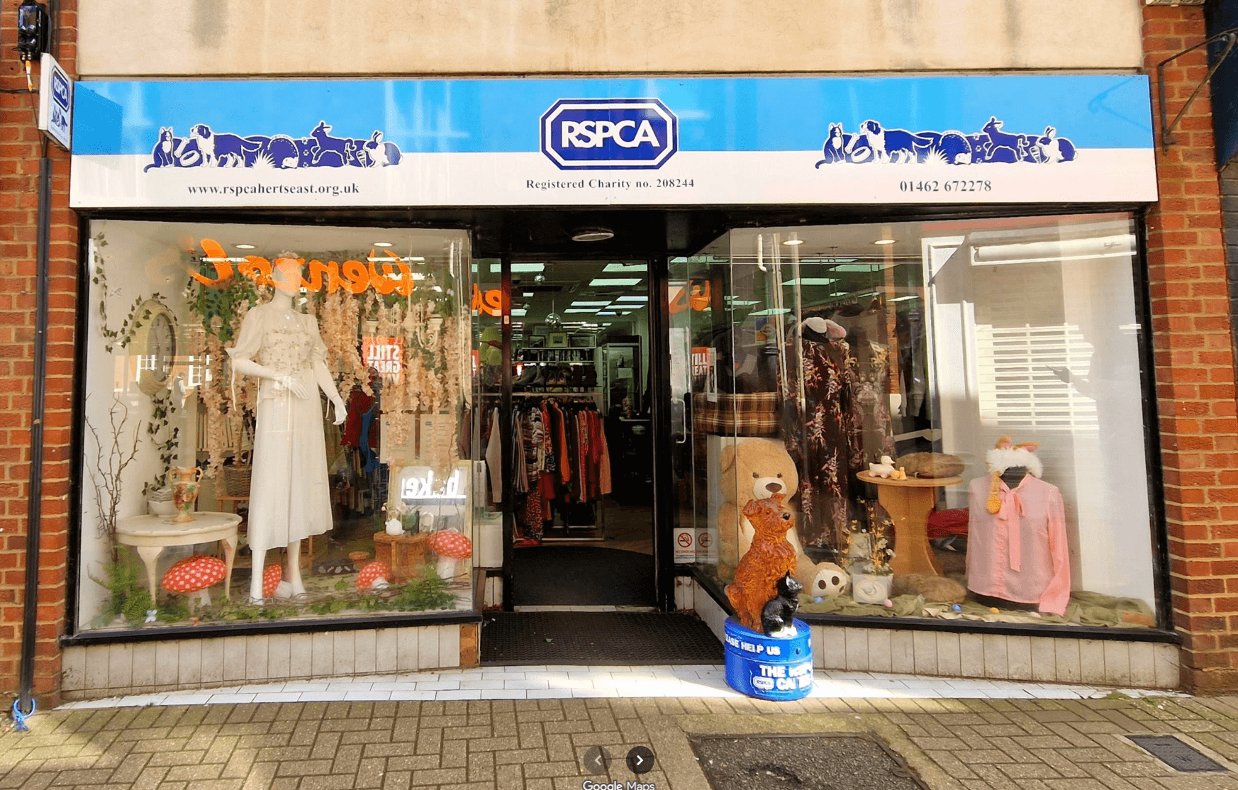 Screenshot 2026-05-12 121832 RSPCA charity shop storefront with clothing displays